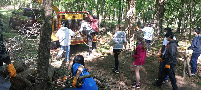 students doing community service outside